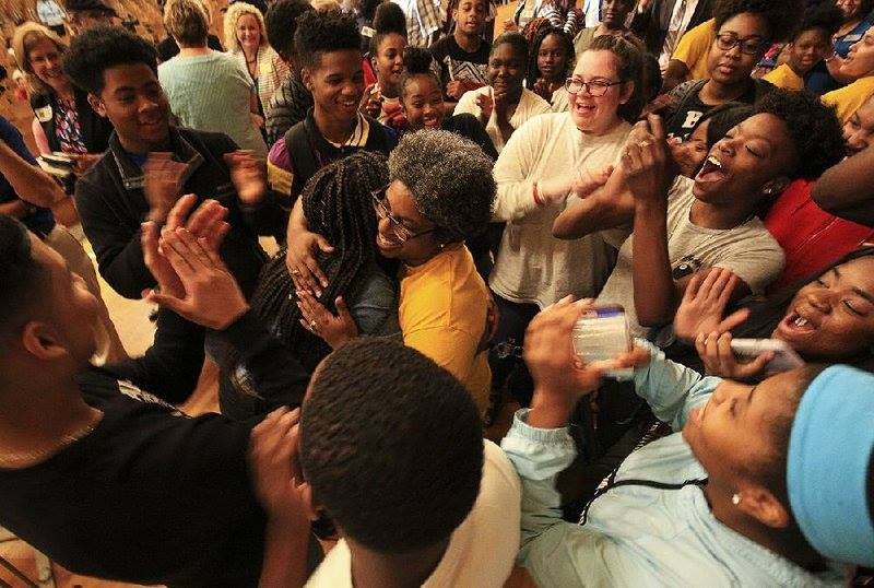 On stage in the auditorium of Little Rock Central High School being embraced by my AVID students & Writeous Poets shortly after being named 2019 Arkansas Teacher of the Year.
